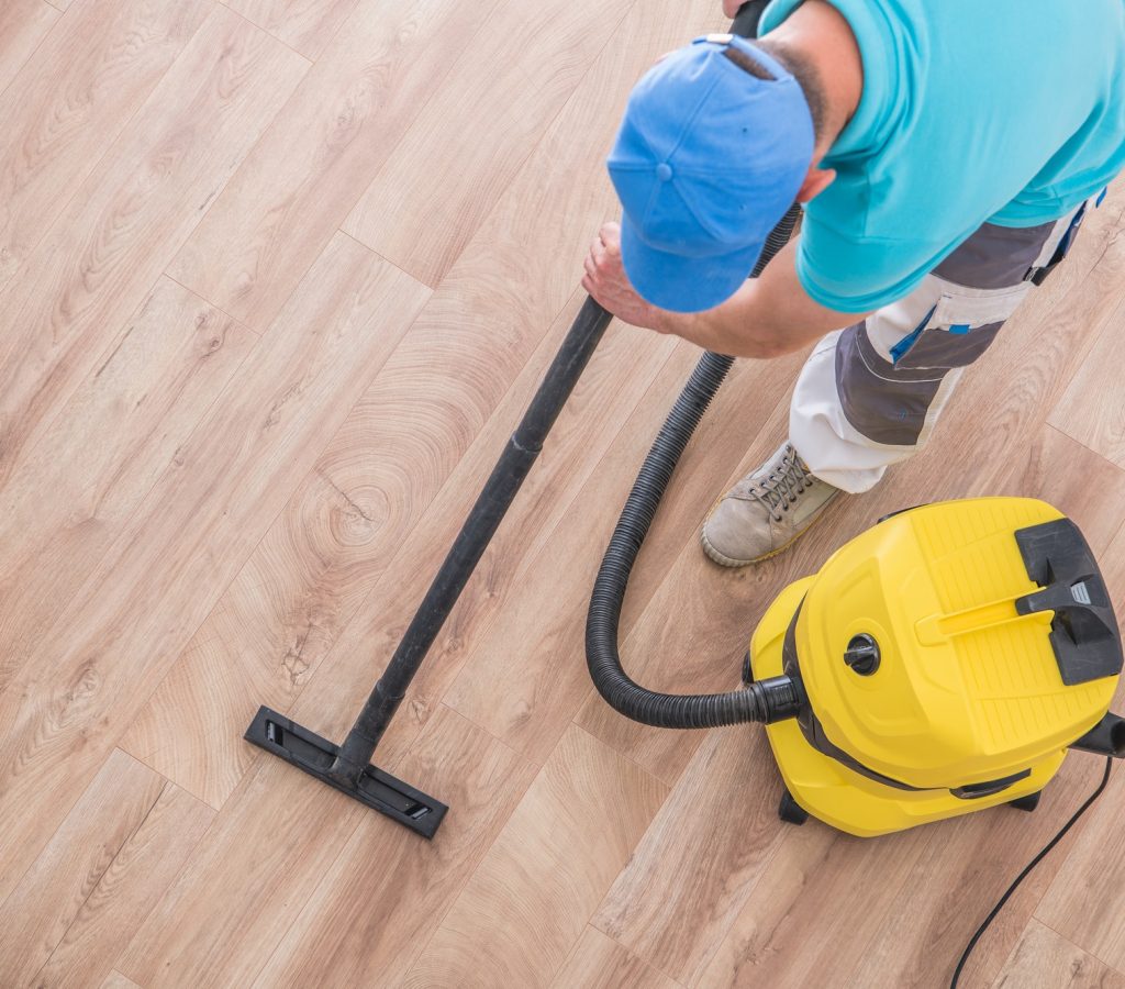 men-vacuuming-apartment.jpg